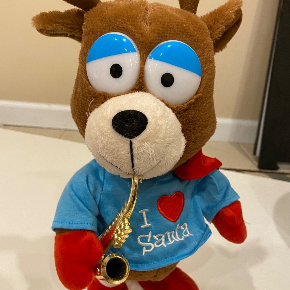 plush trumpet playing reindeer christmas